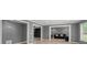 Spacious open-concept living room with an abundance of natural light and seamless flow at 1709 Grove Se Ct, Conyers, GA 30013