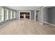 Open-concept living space with plenty of natural light flowing into kitchen at 1709 Grove Se Ct, Conyers, GA 30013