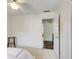 Bedroom with neutral walls, ceiling fan, and access to hall at 1870 Milfield Cir, Snellville, GA 30078