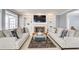 Cozy living room features a fireplace with built-in shelving and comfortable seating at 1870 Milfield Cir, Snellville, GA 30078