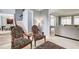 Open-concept living space featuring stylish furnishings and access to the dining area at 1870 Milfield Cir, Snellville, GA 30078