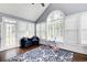 Bright sunroom features a large window, vaulted ceilings, and lots of natural light at 1870 Milfield Cir, Snellville, GA 30078