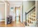 Inviting foyer with hardwood floors and a staircase leading to the upper level at 7310 Ne Wynhill Ne Dr, Atlanta, GA 30328