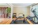 Exercise room featuring hardwood floor and fitness equipment, great for a home gym at 7310 Ne Wynhill Ne Dr, Atlanta, GA 30328