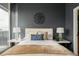 Serene bedroom features a comfortable bed, elegant decor, and a large window with a stunning city view at 855 Peachtree Ne St # 2913, Atlanta, GA 30308