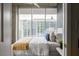 Cozy bedroom with large windows, offering an amazing city view and plenty of natural light at 855 Peachtree Ne St # 2913, Atlanta, GA 30308