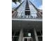 View of Viewpoint building's front entrance featuring modern architecture and prominent signage at 855 Peachtree Ne St # 2913, Atlanta, GA 30308