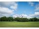 Scenic cityscape view showcasing modern architecture, lush greenery, and clear blue skies at 855 Peachtree Ne St # 2913, Atlanta, GA 30308