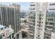 Modern high-rise residential building with floor-to-ceiling windows and city views at 855 Peachtree Ne St # 2913, Atlanta, GA 30308