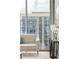 Stylish living room with floor-to-ceiling windows and contemporary furnishings at 855 Peachtree Ne St # 2913, Atlanta, GA 30308
