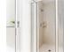 Bright bathroom with frameless shower with white tiling and new fixtures at 855 Peachtree Ne St # 2913, Atlanta, GA 30308