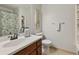Clean bathroom with vanity, toilet, shower with curtain, and decor at 860 The Cir, Lawrenceville, GA 30043