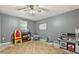 Spacious room featuring tile floors, window, and fun décor at 860 The Cir, Lawrenceville, GA 30043