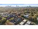 Aerial view showcasing the community's layout, featuring lush greenery, townhomes, and easy access to Atlanta at 869 Briarcliff Ne Rd # B20, Atlanta, GA 30306