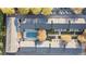 Aerial view of a community with a sparkling pool and well-maintained buildings and landscaped grounds at 869 Briarcliff Ne Rd # B20, Atlanta, GA 30306