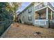 Backyard featuring gravel area and wrought iron patio at 869 Briarcliff Ne Rd # B20, Atlanta, GA 30306