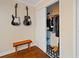 Bedroom closet with star tile, guitars on wall and a bench at 869 Briarcliff Ne Rd # B20, Atlanta, GA 30306