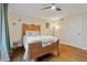 Well-lit bedroom showcasing hardwood floors, a neutral color palette, and a ceiling fan at 869 Briarcliff Ne Rd # B20, Atlanta, GA 30306