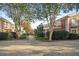 Beautifully landscaped common areas with mature trees and walkway at 869 Briarcliff Ne Rd # B20, Atlanta, GA 30306