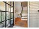 This entryway features hardwood floors, chair railing, and stairs leading to the upper level at 869 Briarcliff Ne Rd # B20, Atlanta, GA 30306