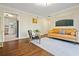 Comfortable living room featuring hardwood floors adjacent to the well-appointed kitchen at 869 Briarcliff Ne Rd # B20, Atlanta, GA 30306