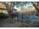 Pool area with mature trees and wrought iron fencing at 869 Briarcliff Ne Rd # B20, Atlanta, GA 30306