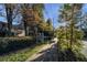 Street view of complex with mature trees and manicured landscaping at 869 Briarcliff Ne Rd # B20, Atlanta, GA 30306