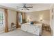 Comfortable bedroom with neutral tones, ceiling fan and ample natural light at 443 Langley Oaks Dr, Marietta, GA 30067