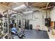 Basement gym with nautilus equipment and weights at 443 Langley Oaks Dr, Marietta, GA 30067