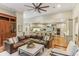 Open concept living space with kitchen and living room, hardwood floors, and lots of natural light at 443 Langley Oaks Dr, Marietta, GA 30067