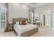 Serene main bedroom features two windows, and an ensuite bathroom at 443 Langley Oaks Dr, Marietta, GA 30067