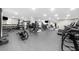 Modern gym featuring a variety of cardio machines and free weights in a bright, spacious setting at 800 Peachtree Ne St # 8607, Atlanta, GA 30308