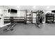 Brightly lit fitness center offering free weights, machines, and mirrored walls at 800 Peachtree Ne St # 8607, Atlanta, GA 30308