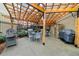Outdoor grill area with a pergola covering multiple grills and tables, perfect for summer cookouts at 800 Peachtree Ne St # 8607, Atlanta, GA 30308
