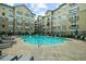 Resort-style pool surrounded by lounge chairs, perfect for relaxation and enjoying sunny days at 800 Peachtree Ne St # 8607, Atlanta, GA 30308