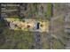 Aerial view of the property highlighting the 1.16 acre lot, surrounded by lush greenery at 10845 Shallowford Rd, Roswell, GA 30075