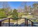 Great view of a well-manicured lawn and mature trees, providing a private backyard at 10845 Shallowford Rd, Roswell, GA 30075