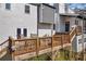 Wooden deck with outdoor seating, offering great views at 10845 Shallowford Rd, Roswell, GA 30075