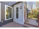 Inviting front entrance with a red door, providing a warm welcome to guests at 10845 Shallowford Rd, Roswell, GA 30075