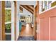 Inviting foyer with hardwood floors leading to a bright living space with fireplace at 10845 Shallowford Rd, Roswell, GA 30075