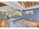 Open living area showcasing hardwood floors, high wood ceiling and traditional decor at 10845 Shallowford Rd, Roswell, GA 30075