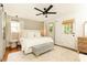 Serene bedroom with plush carpet, ample natural light, and a soothing color palette, perfect for rest at 1329 W Nancy Creek Ne Dr, Brookhaven, GA 30319