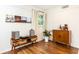 Cozy living room showcasing stylish mid-century furniture, hardwood floors, and a relaxed atmosphere at 1329 W Nancy Creek Ne Dr, Brookhaven, GA 30319