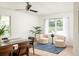 Bright dining room features cozy seating area, modern ceiling fan, and natural light at 2041 Trailwood Rd, Decatur, GA 30032