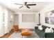 Cozy living room with stylish decor, showcasing hardwood floors and a comfortable seating arrangement at 2041 Trailwood Rd, Decatur, GA 30032