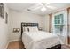 Bedroom with a queen size bed, neutral color palette and natural light at 5519 Princeton Oaks Ln, Sugar Hill, GA 30518