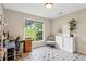 Office space with a large window offering natural light at 5519 Princeton Oaks Ln, Sugar Hill, GA 30518