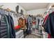Walk-in closet with ample space for clothes and storage at 5519 Princeton Oaks Ln, Sugar Hill, GA 30518