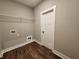 Laundry room with shelving and easy access at 92 Jeffrey Ln, Dallas, GA 30157