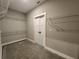 Walk-in closet with shelving and bi-fold door at 92 Jeffrey Ln, Dallas, GA 30157